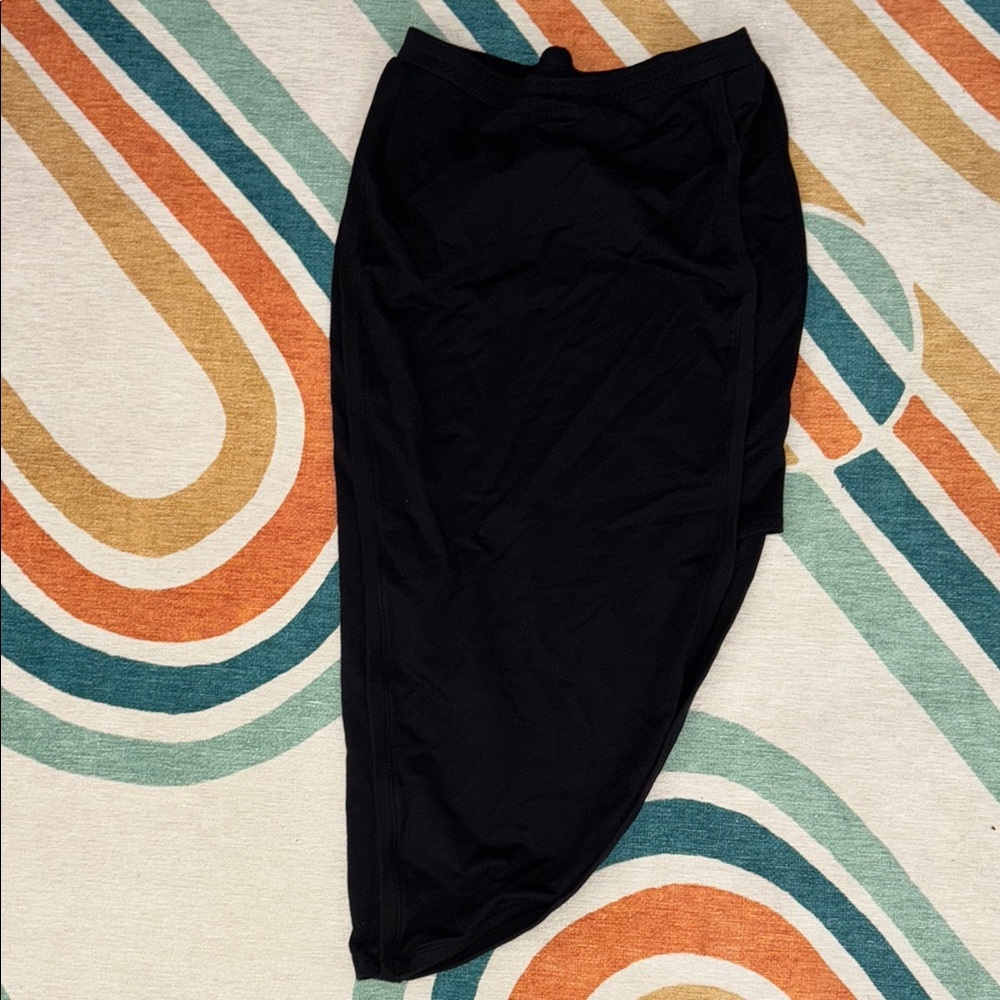Asymmetrical form fitting Black Skirt